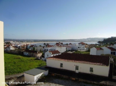 Rijtjes huis met zicht op de baai